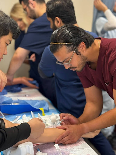 new class of residents learning during simulation trainings prior to the start of their rotations.
